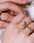 beautiful handcrafted pearl ring featuring sculpted and handcrafted gold frame