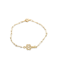 Gold bracelet with a unique clasp design on a white background