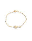 Gold bracelet with a key-shaped clasp on a white background