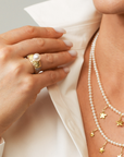 Beautiful gold diamonds and pearls ring on an model