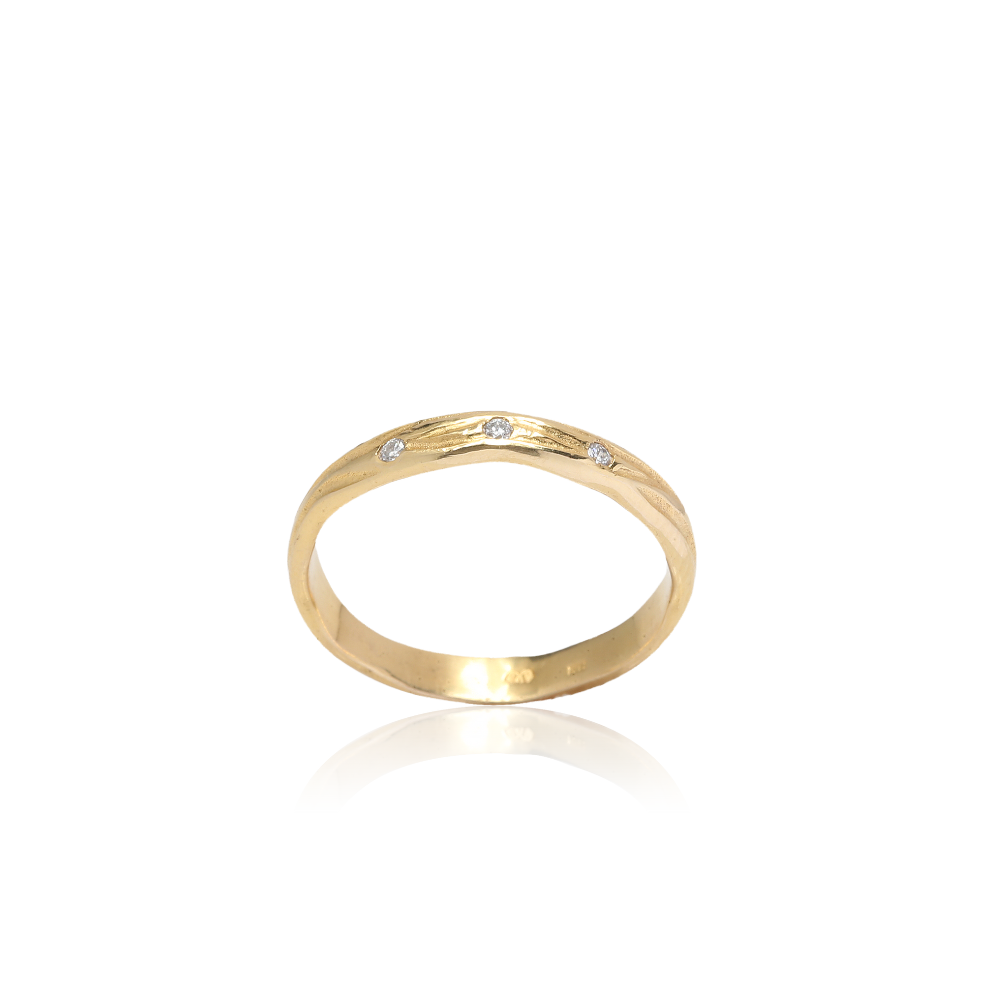 Gold ring with small diamonds on a white background
