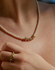 Marilisi artisan fine jewelry White Pearl Yellow Necklace with floral design Mille Fleurs on model