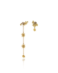 asymmetrical gold celestial earrings with cascading starburst motifs and diamond accents