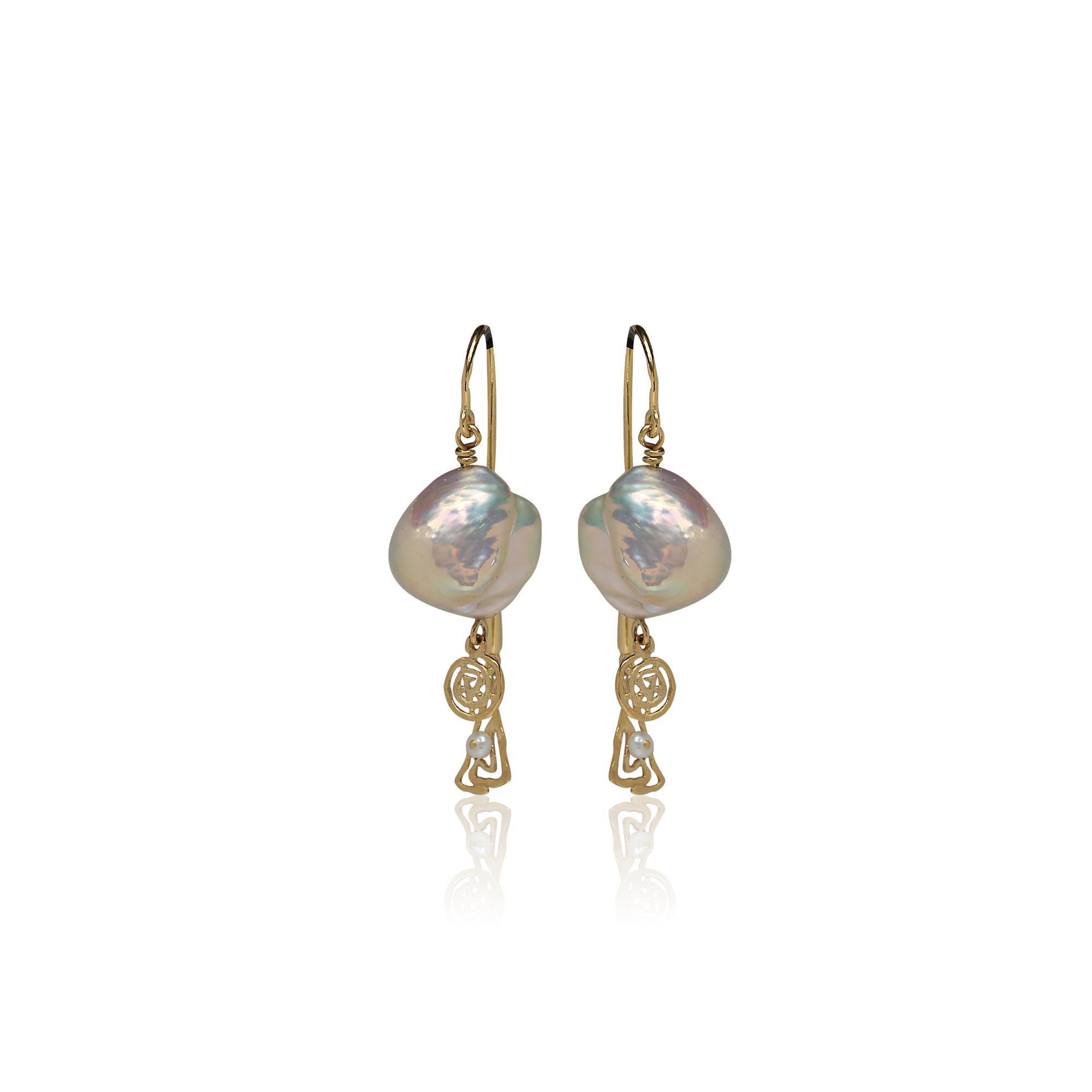 Pair of pearl earrings with gold hooks on a white background