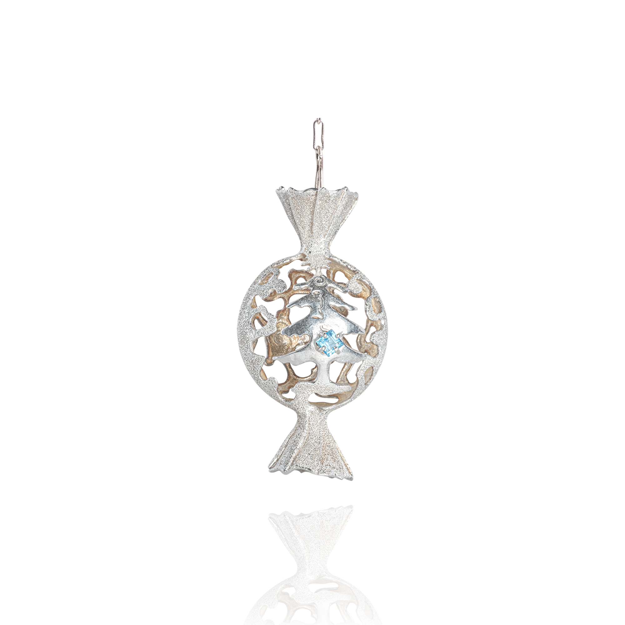 Sterling silver Christmas ornament shaped like a festive candy, featuring a Christmas tree motif with blue decorative accents and openwork detailing.