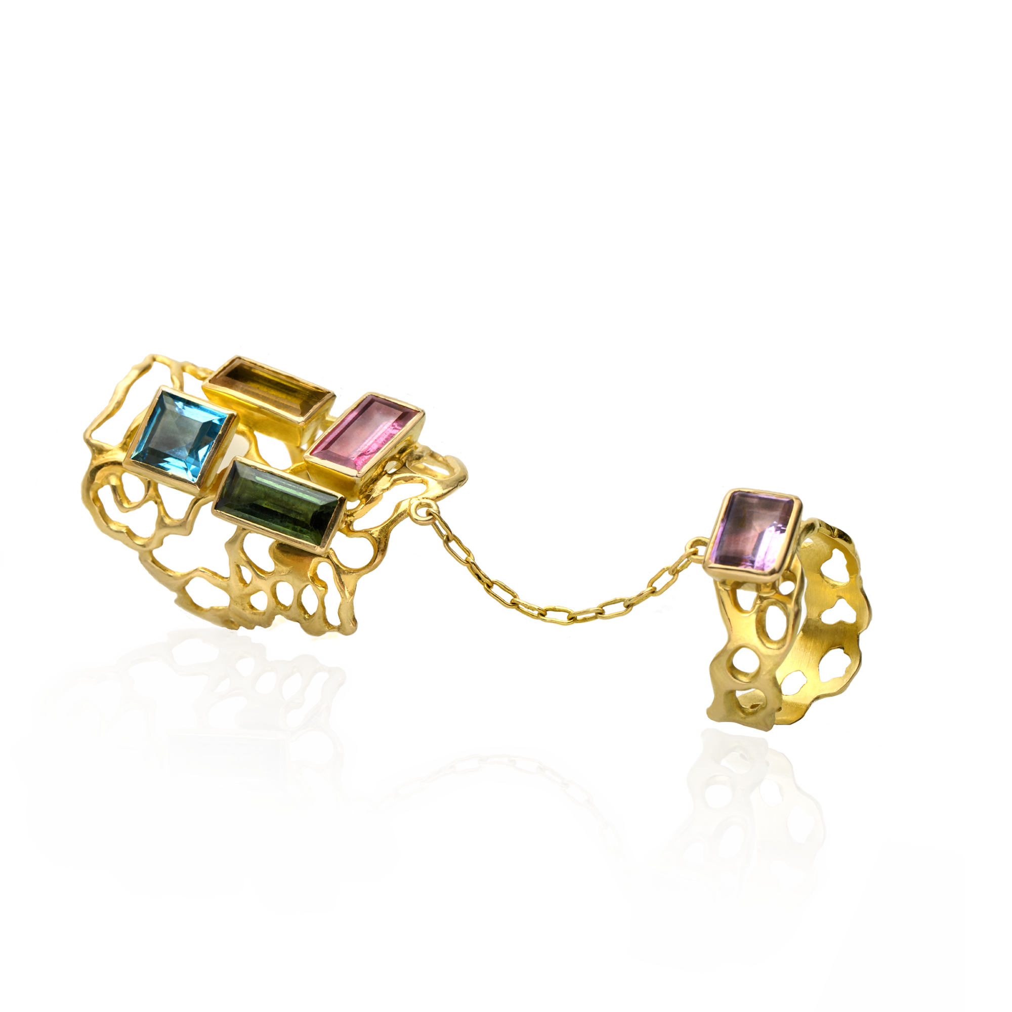 Gold bracelet with colorful gemstones on a white background