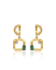 Gold earrings with green gemstones on a white background