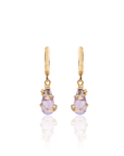 Gold earrings with purple teardrop-shaped gemstones on a white background
