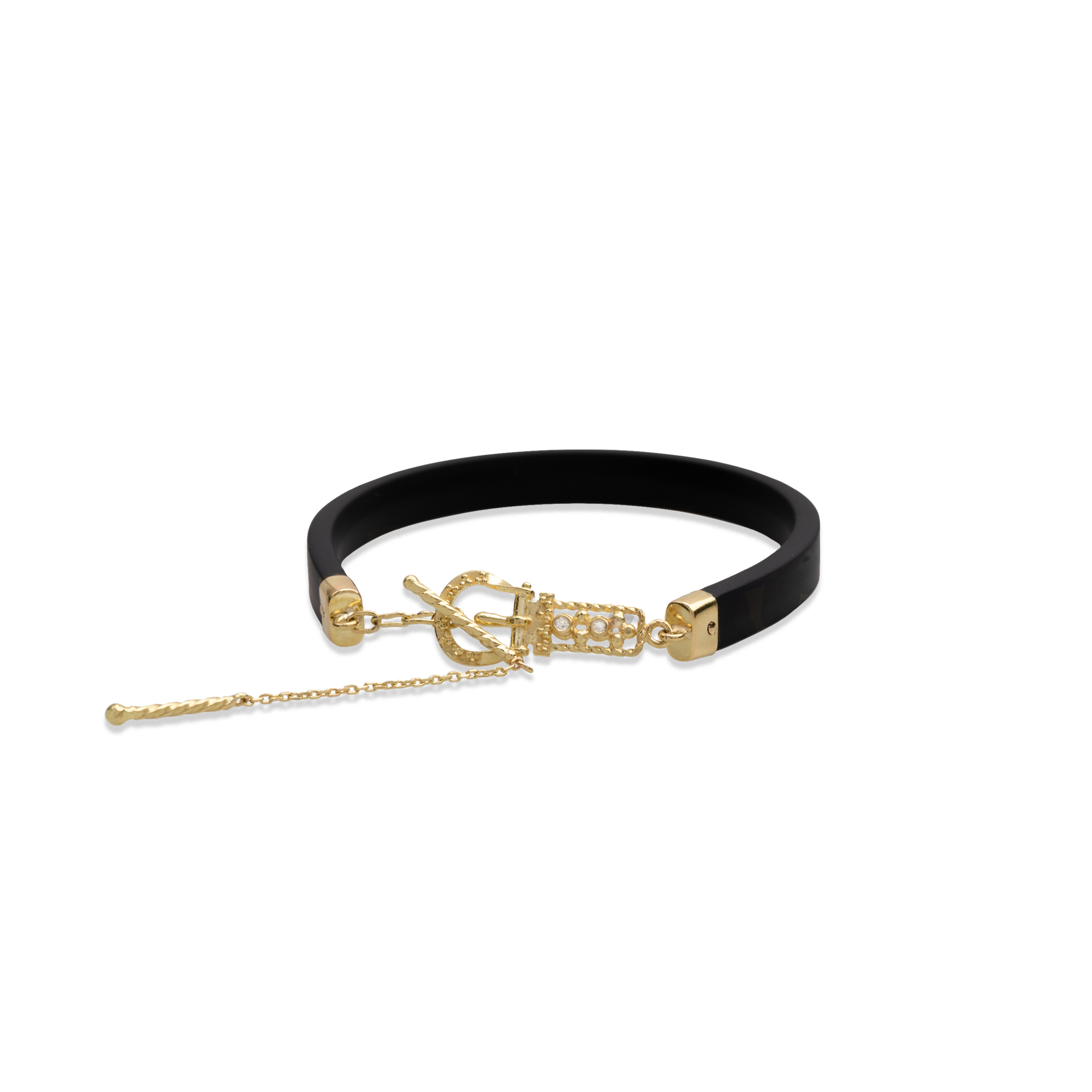Black rubber bracelet with gold accents on a white background
