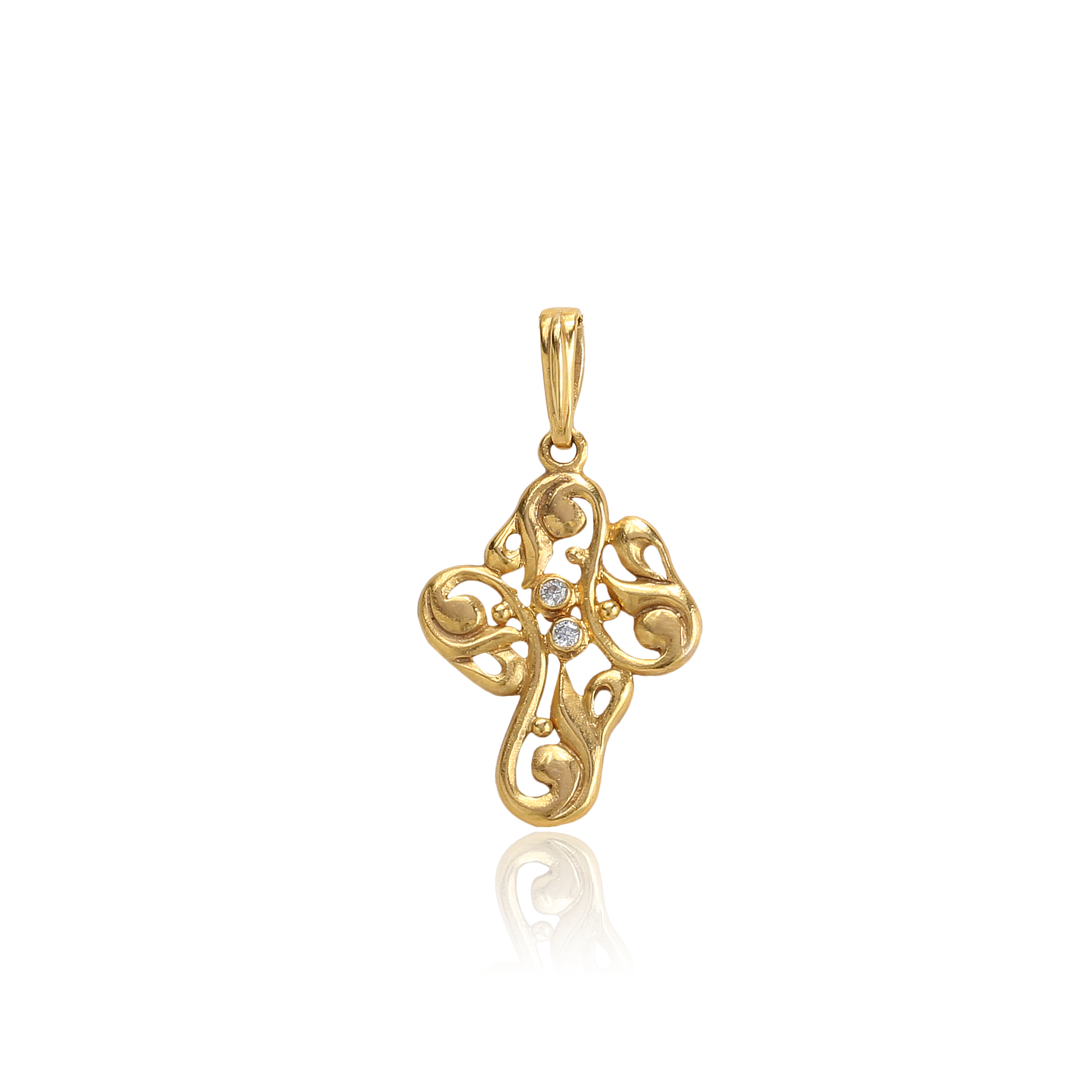 Gold cross with intricate design on a white background
