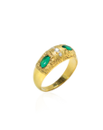 Gold ring with green gemstones and diamond accents on a white background