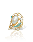 Gold ring with a large central pearl and smaller stones on a white background