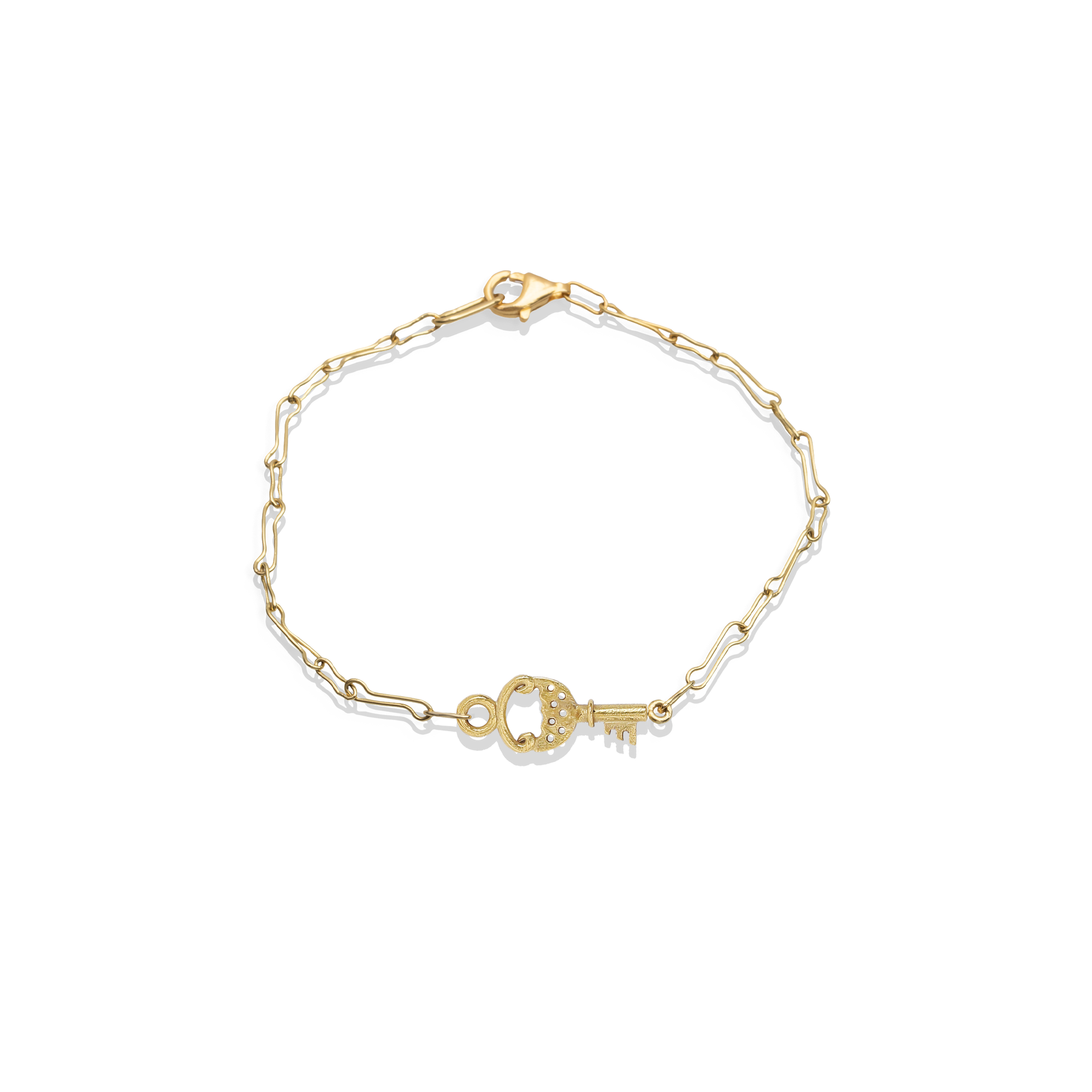gold bracelet with key charm
