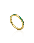 Gold ring with green gemstones on a white background