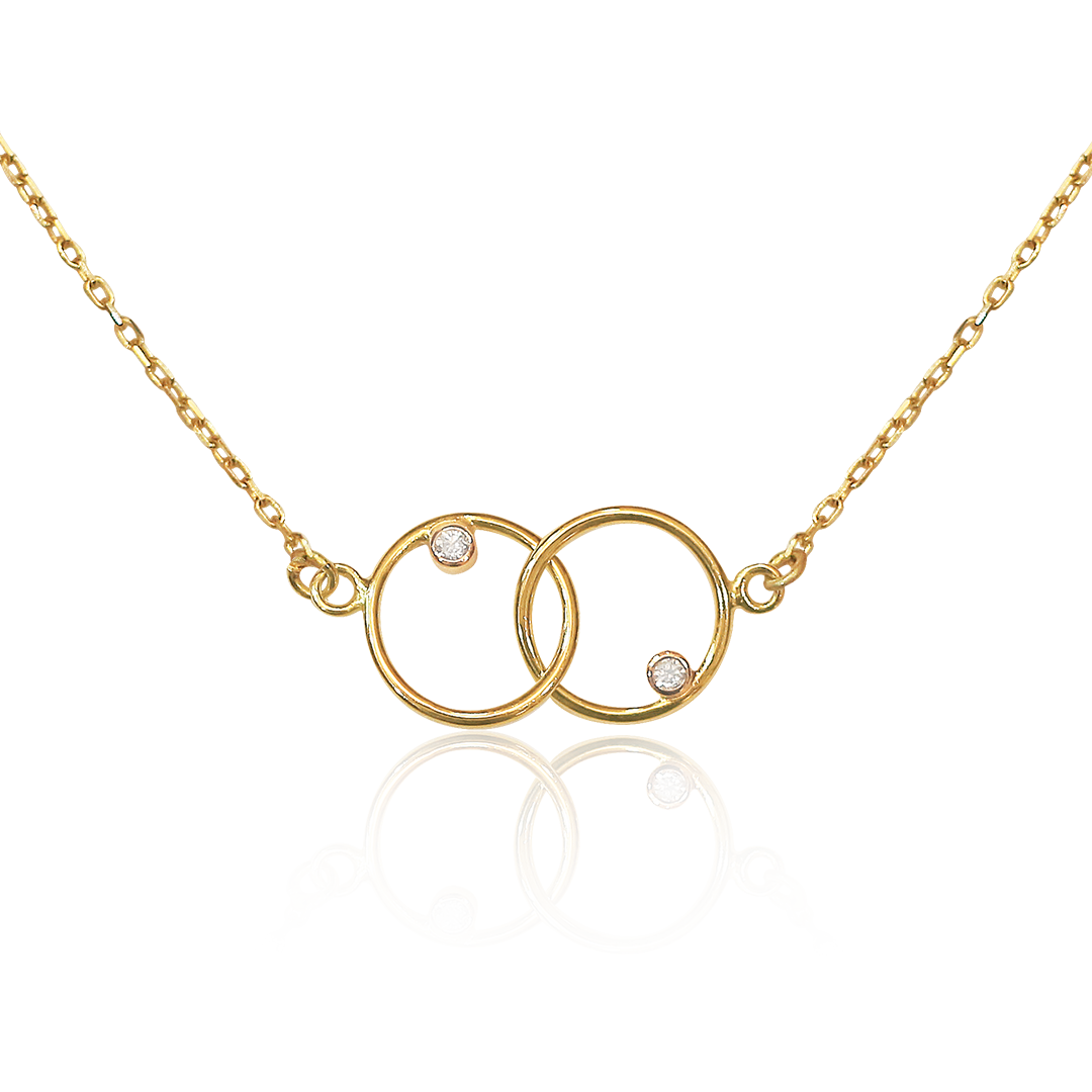 Gold necklace with interlocking rings and small diamonds on a white background