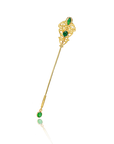 Gold brooch with green gemstones on a white background