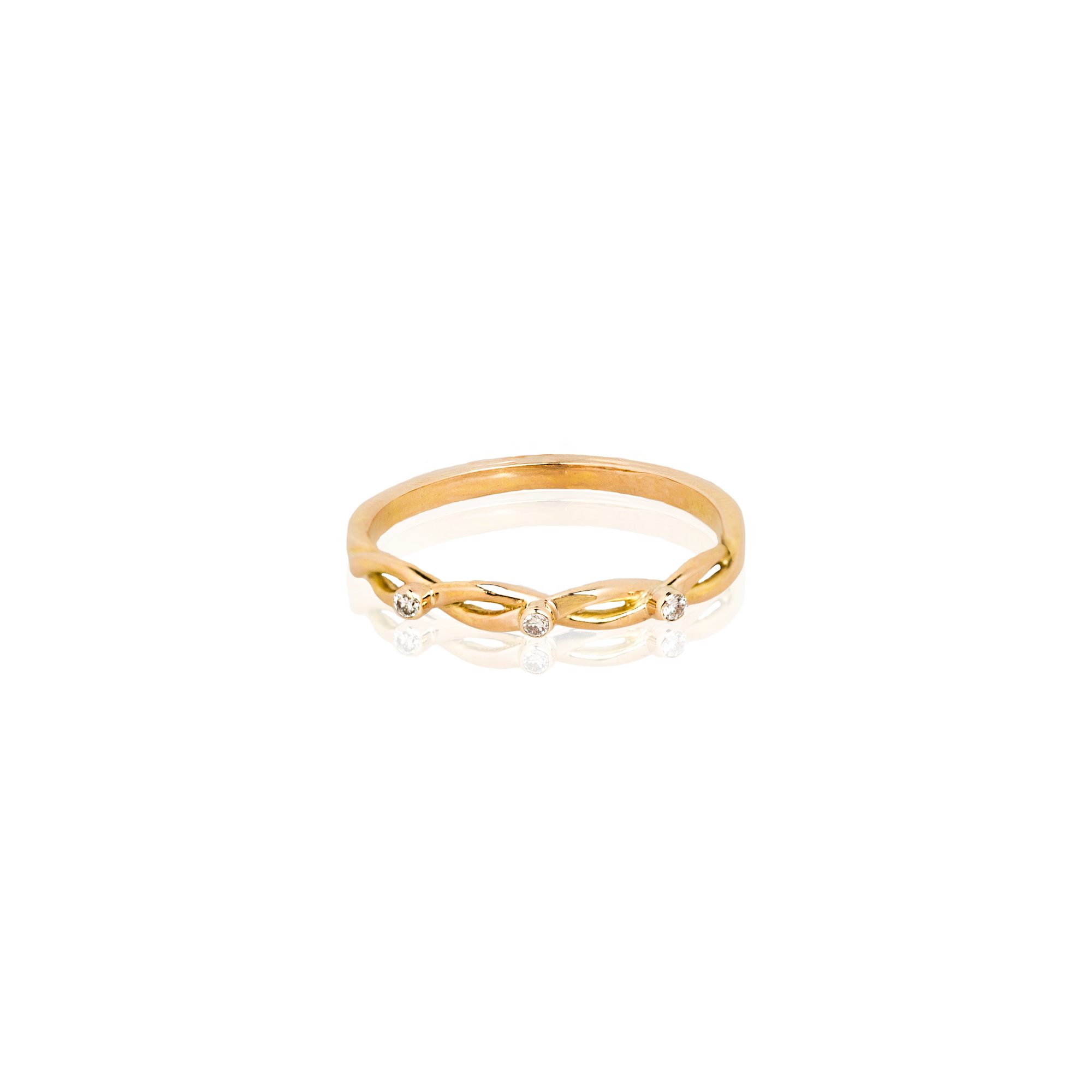 Gold ring with small diamonds on a white background