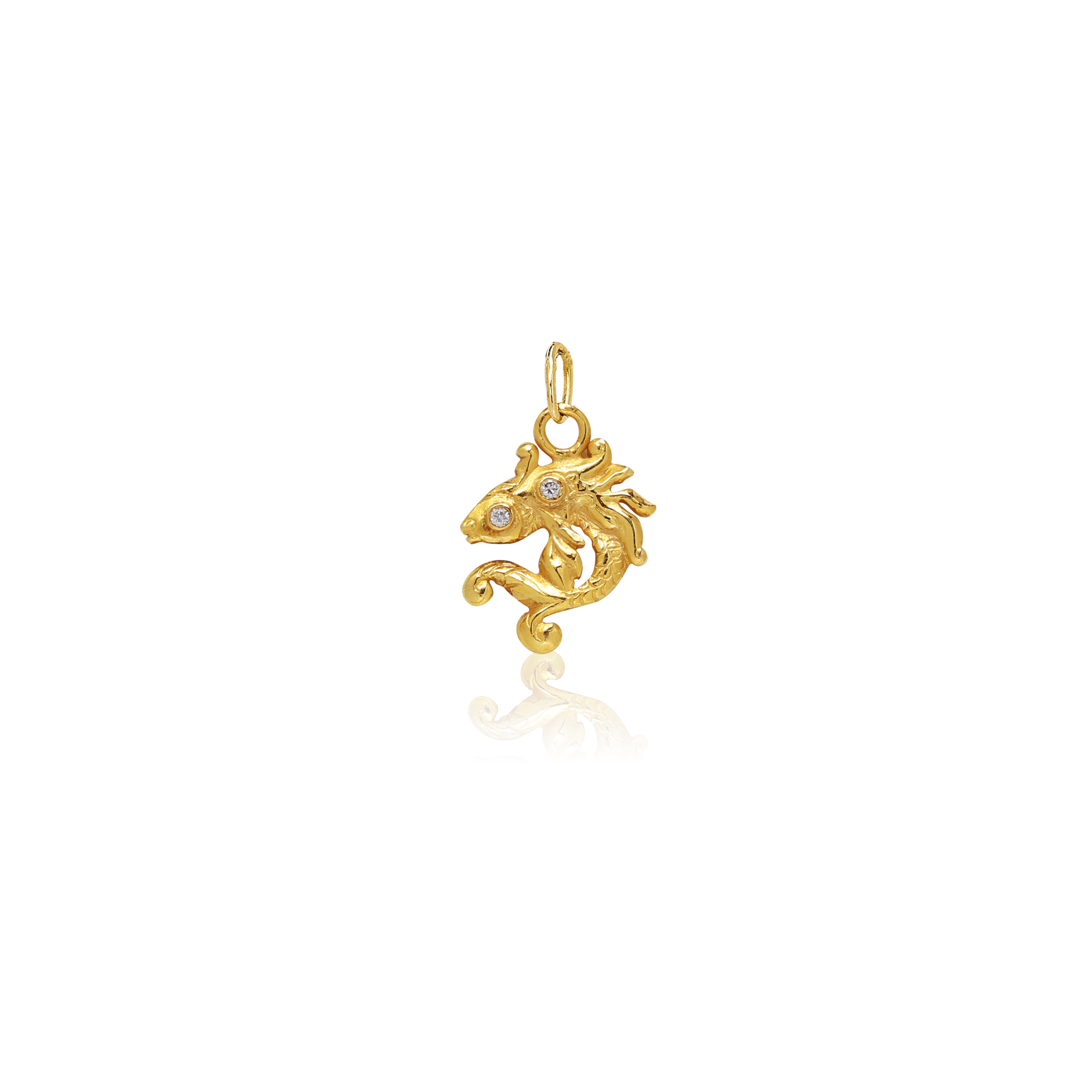 Gold pendant with a white background