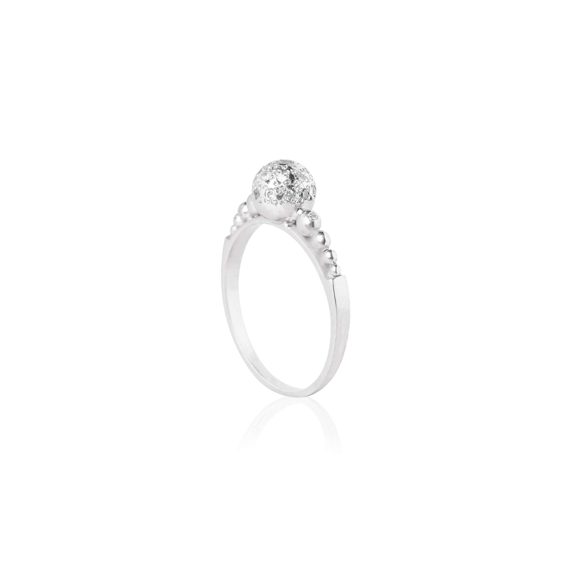 white gold ring with a diamond on a white background