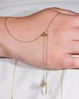 Marilisi artisan fine jewelry Yellow Gold Necklace Dragonfly charm on model