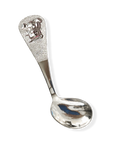 Silver spoon with decorative handle on a white background