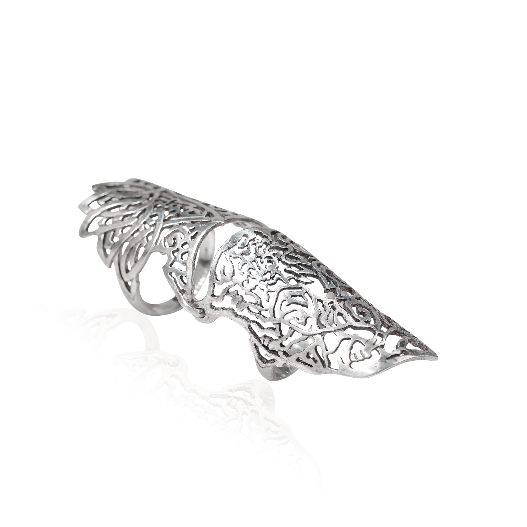 Silver ring with intricate design on a white background