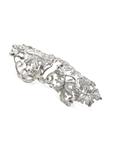 Silver armor ring with intricate design on a white background