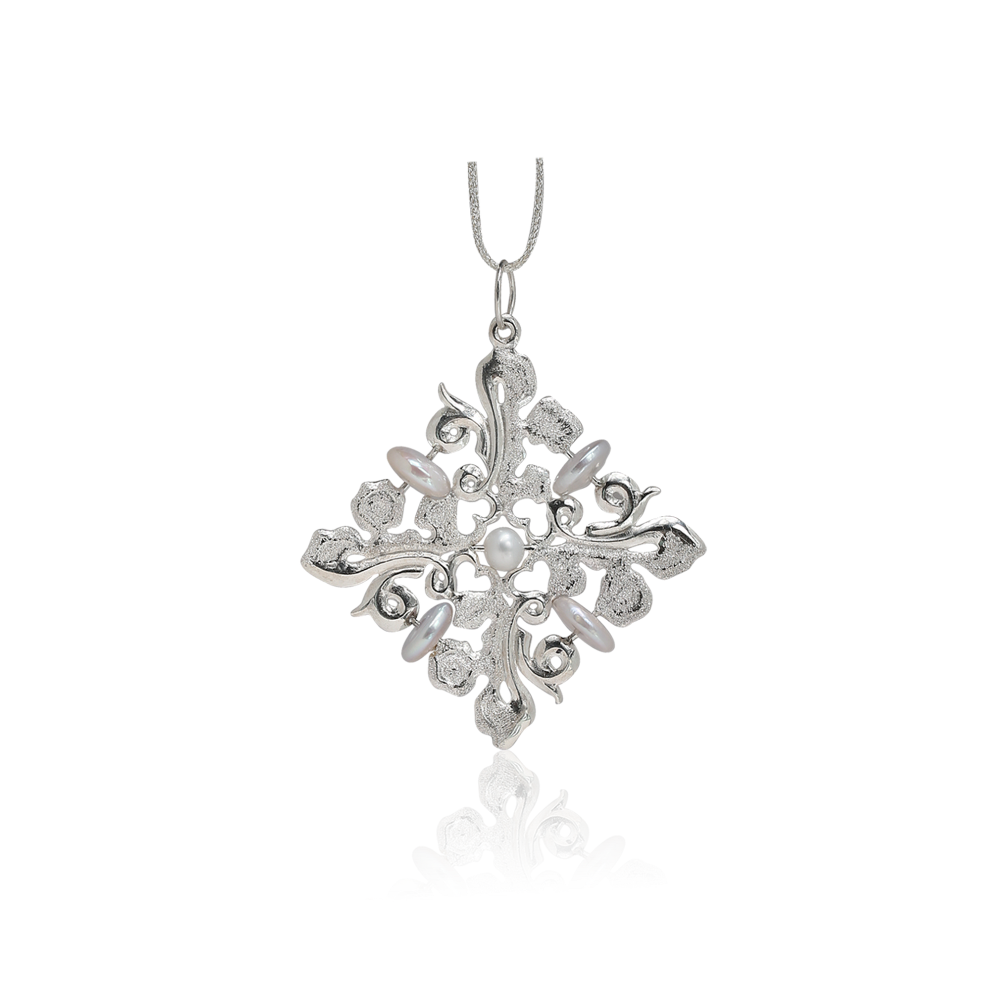 Silver snowflake Christmas ornament on a white background