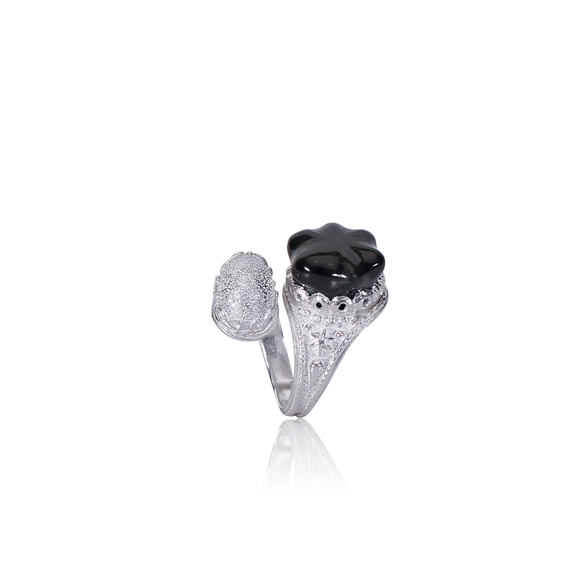 Silver ring with black gemstone on a white background
