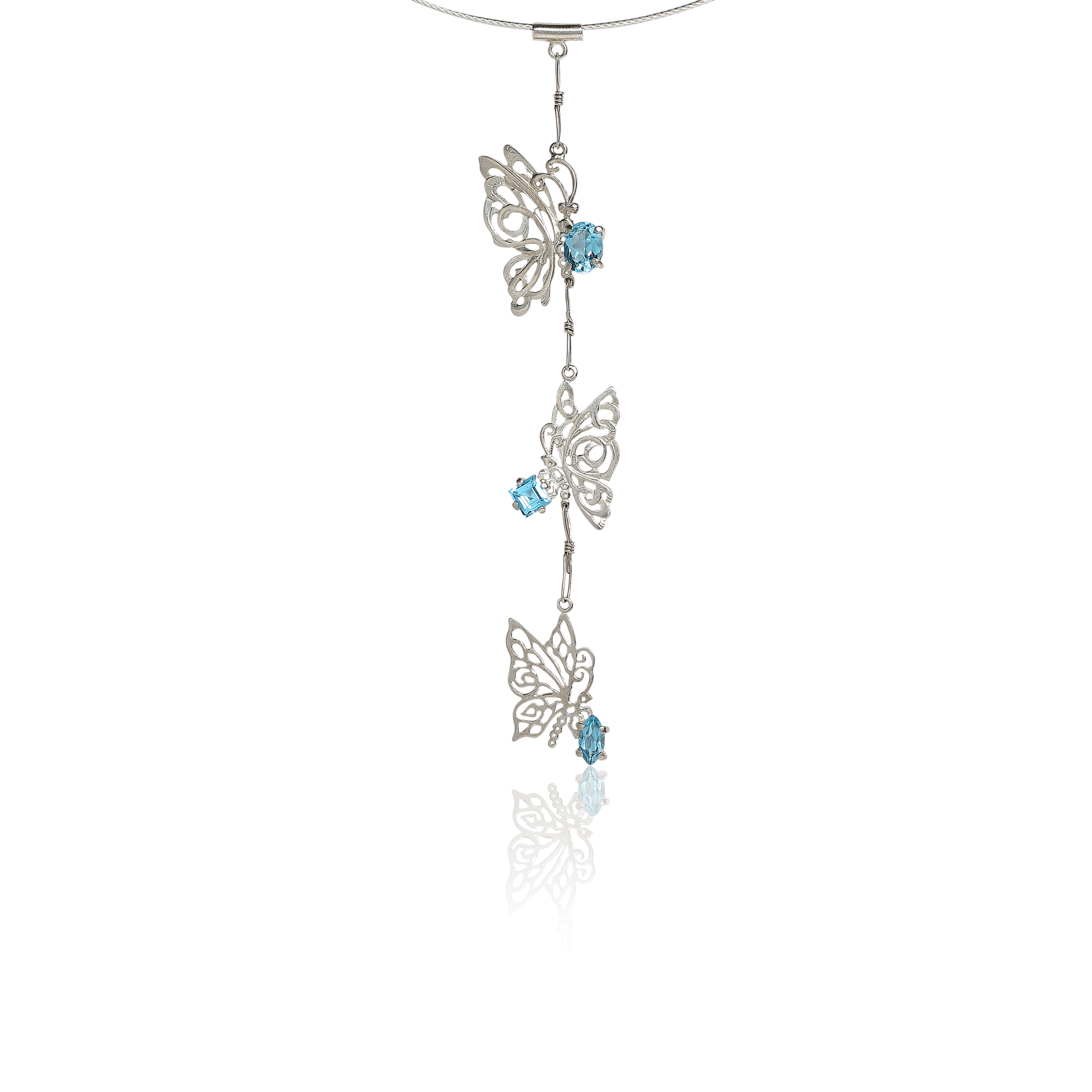 Butterfly-shaped necklace with blue gemstones on a white background