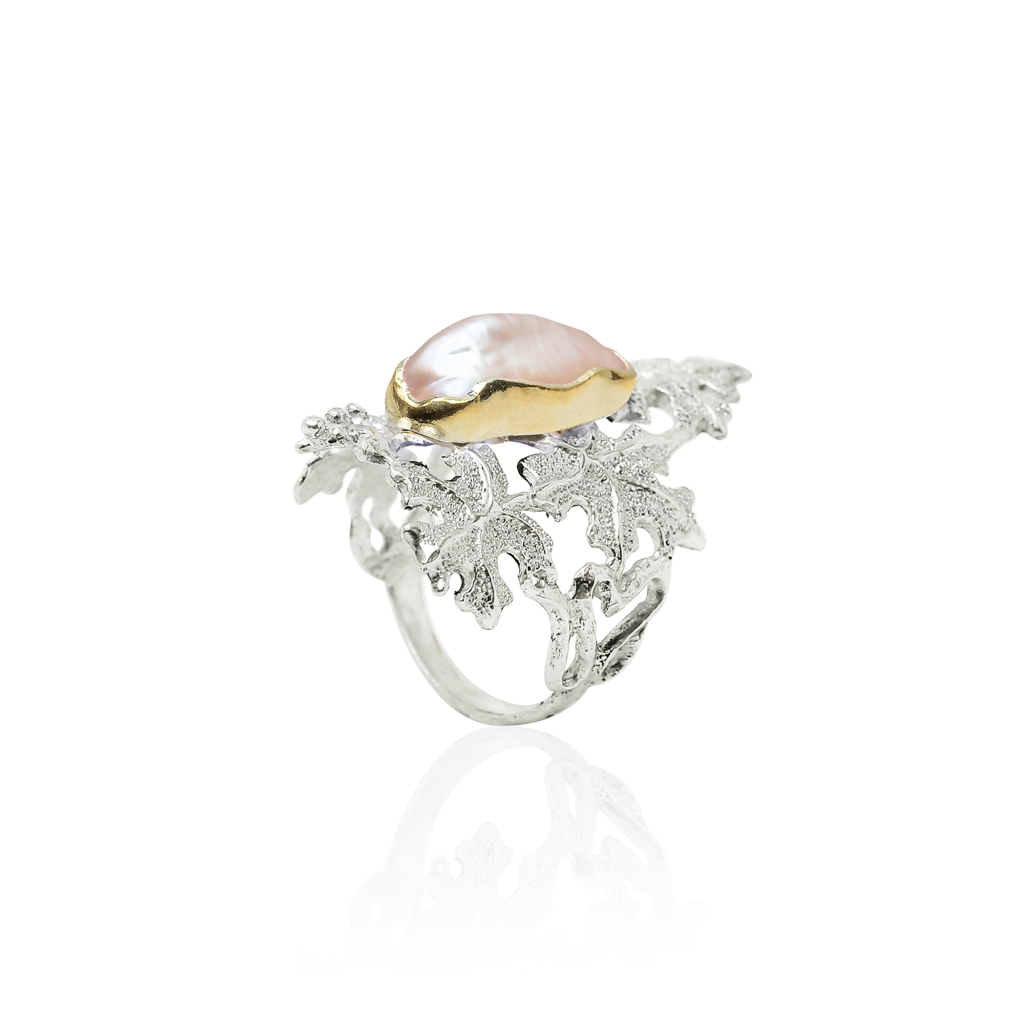 Silver ring with a pink gemstone on a white background