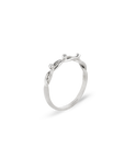 White gold ring featuring three brilliant-cut diamonds set along intertwined vine-inspired bands with an airy sculptural design.