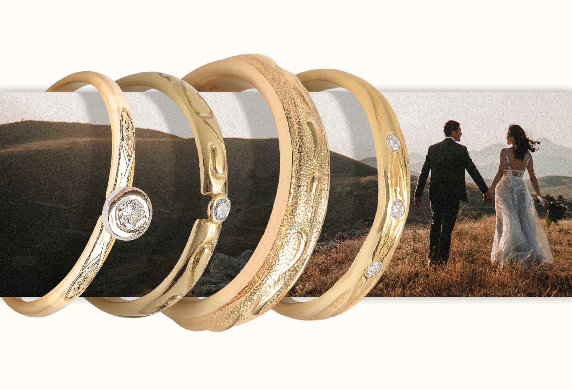 Three gold rings with diamond accents on a cylindrical object, with a blurred background of a couple walking.