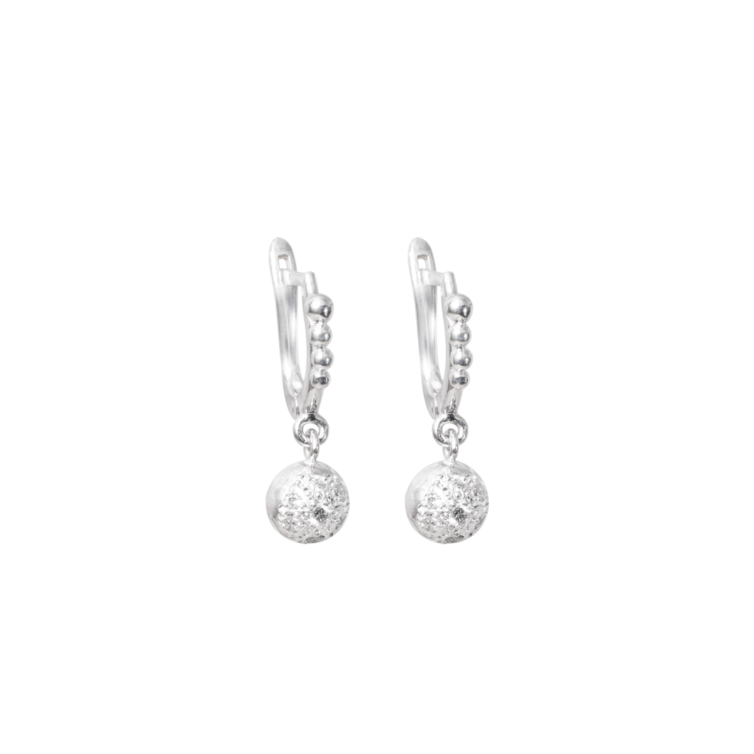 Pair of silver earrings with spherical designs on a white background