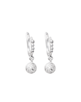 Pair of silver earrings with spherical designs on a white background