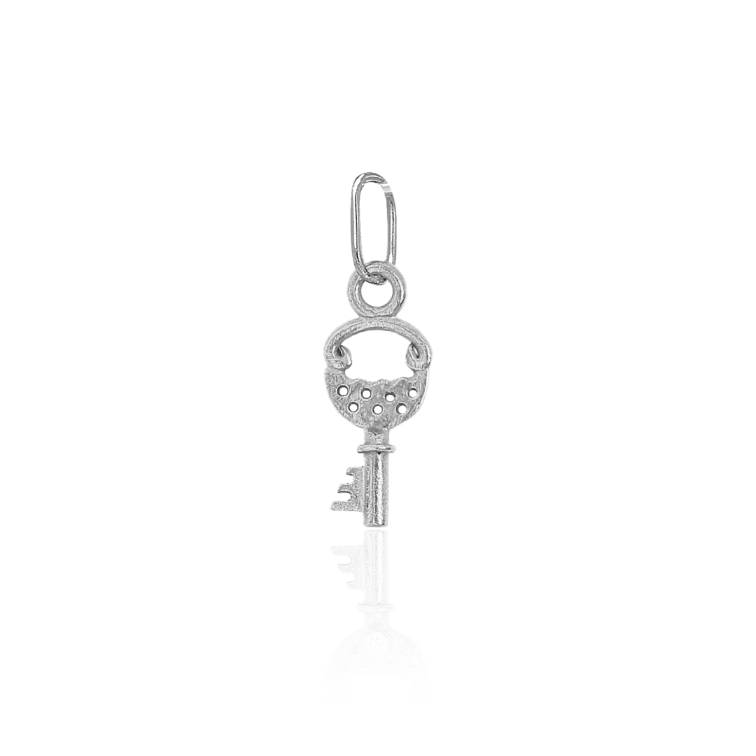 Silver key-shaped pendant on a white background
