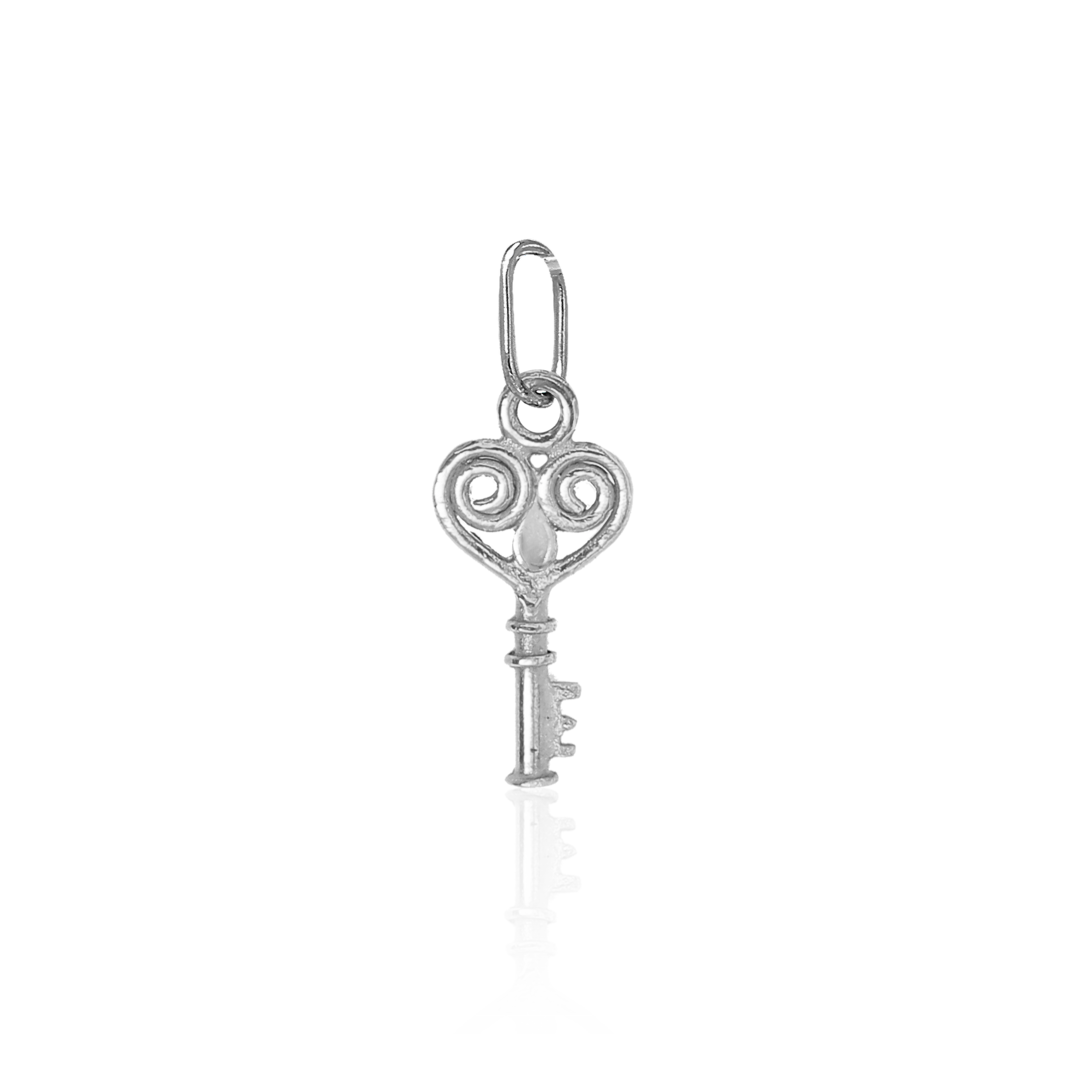 Silver key-shaped pendant on a white background
