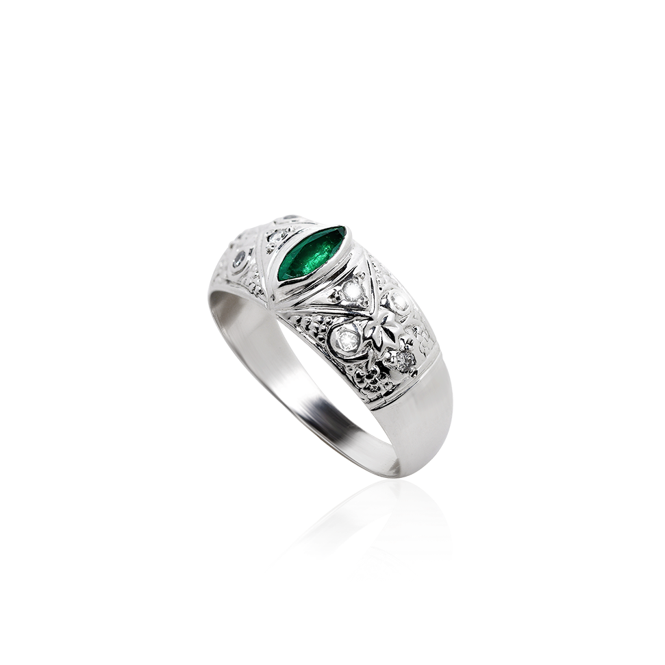 Silver ring with a green gemstone on a white background