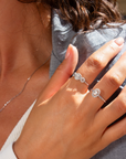Close-up of a hand wearing a marilisi diamond ring